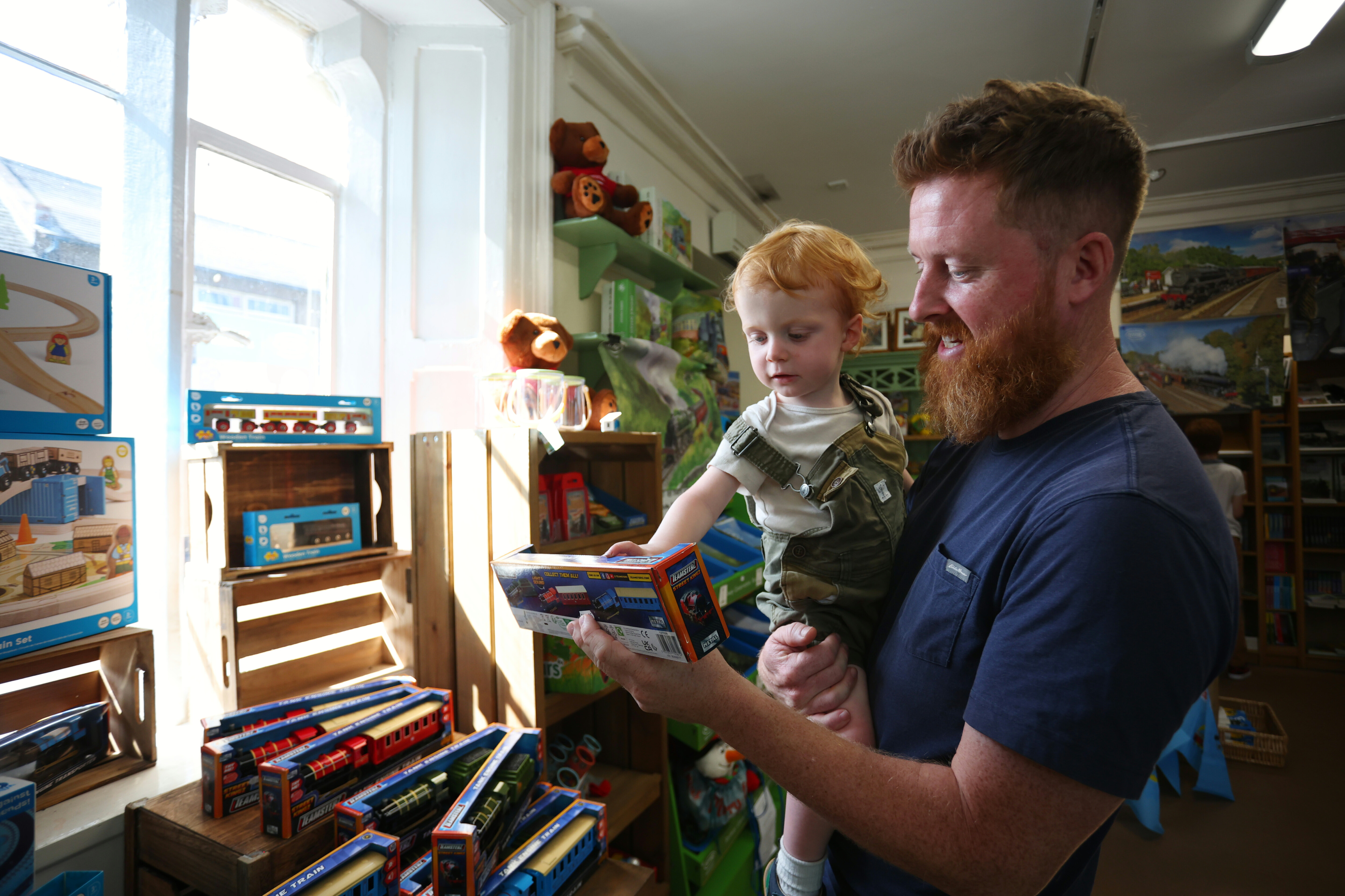 Dad and toddler in shop
