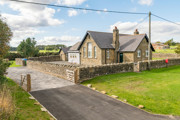The Outstation - a stone-built single storey building which used to be a country school.