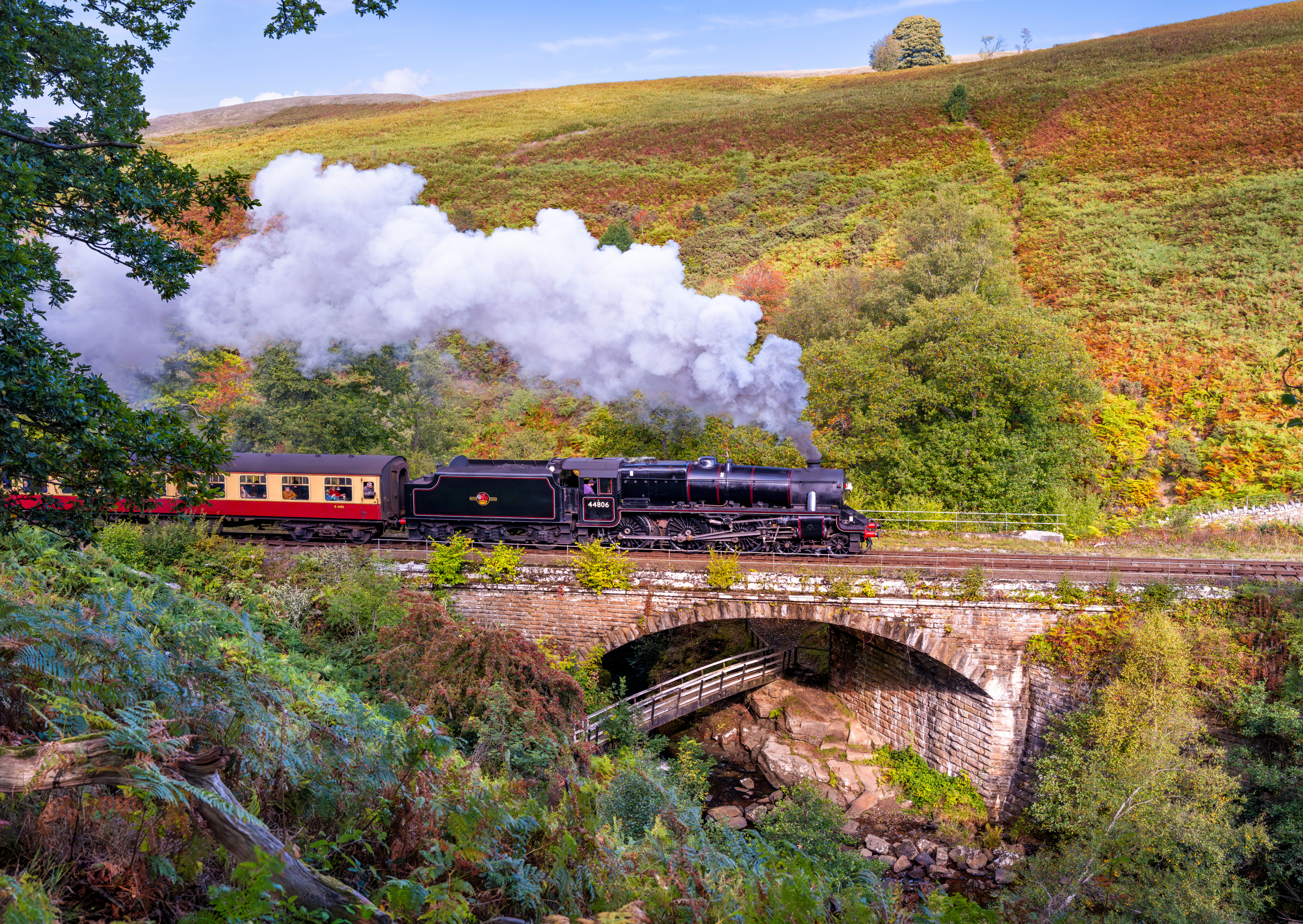 No. 44806 steams across Water Arc bridge in the autumn sun.
