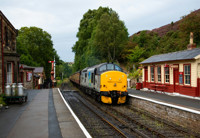 No. 37688 pulls into a damp Goathland Station.