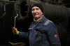 A member of the MPD team with a spanner in hand.