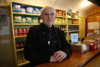 A member of the team behind the buffet bar counter onboard a carriage.