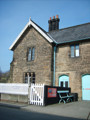 Grosmont Station House exterior with clear blue skies.