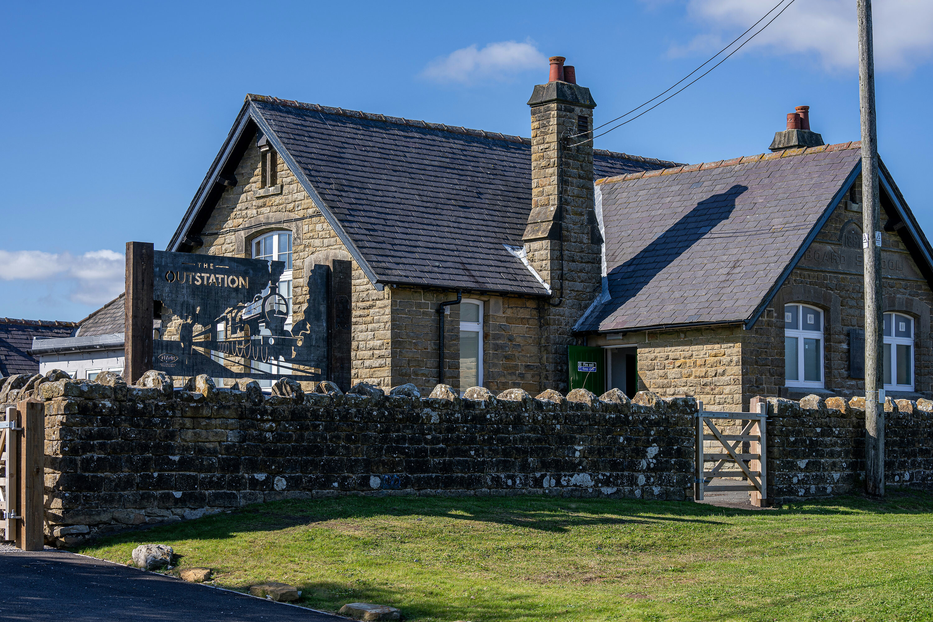The Outstation - a stone-built single storey building which used to be a country school.
