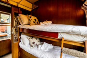 Levisham Camping Coach bunk beds, with flowery cushions.